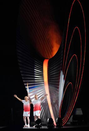 (260919) -- NAGOYA, Sept. 19, 2026 -- Murofushi Koji (R) and Murofushi Shigenobu of Japan wave after they lit the cauldron during the opening ceremony of the 20th Asian Games Aichi-Nagoya 2026 in Nagoya, Japan, Sept. 19, 2026. ) (SP)JAPAN-NAGOYA-ASIAN GAMES-OPENING CEREMONY LuixSiuxWai 
