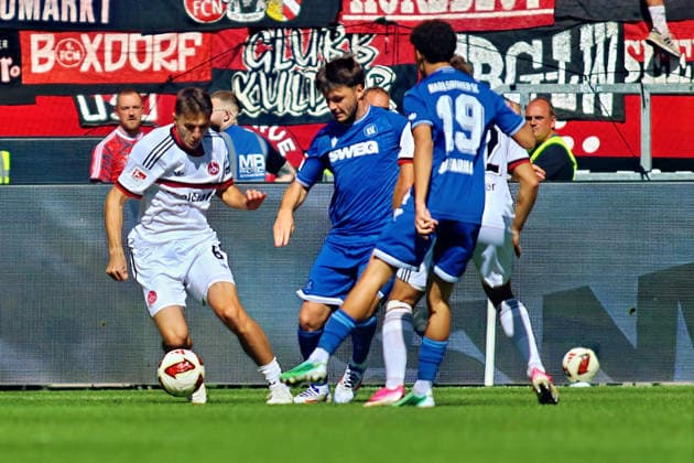 From left: Adam Markhiyev (FC Nuremberg), No. 6 on the ball; Santeri Vaeaenaenen (SC Karlsruhe), No. 6 (GER), SC Karlsruhe vs. FC Nuremberg Soccer Matchday 6, 2026–2027 Season, 2. Bundesliga, September 19, 2026. DFL and DFB regulations prohibit any use of photographs as image sequences and or quasi-video. GER SC Karlsruhe vs. FC Nuremberg Soccer Matchday 6, 2026–2027 Season, September 19, 2026 Copyright: xEibner-Pressefoto JoergxHirschx EP_JHH