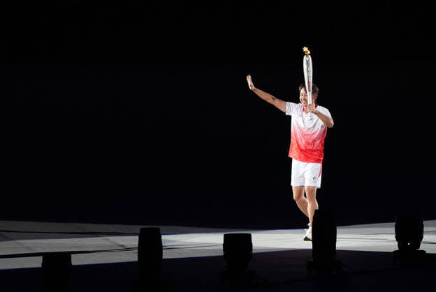 (260919) -- NAGOYA, Sept. 19, 2026 -- Torch bearer Kitajima Kosuke relays the torch during the opening ceremony of the 20th Asian Games Aichi-Nagoya 2026 in Nagoya, Japan, Sept. 19, 2026. ) (SP)JAPAN-NAGOYA-ASIAN GAMES-OPENING CEREMONY LuixSiuxWai 