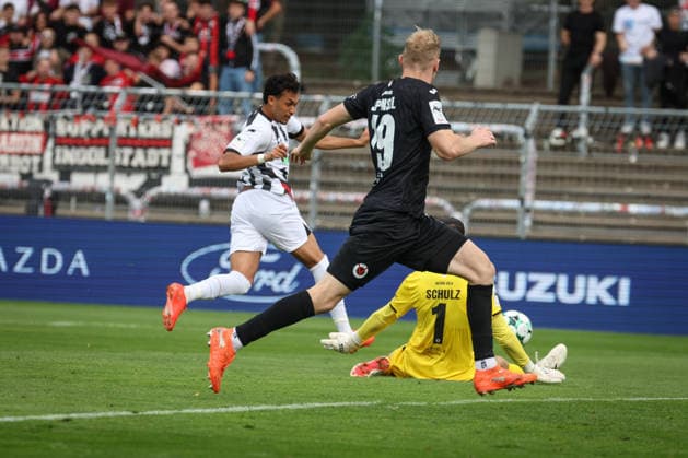 3rd Division, 2026–27 Season: Viktoria Köln vs. FC Ingolstadt 04; Nishan Velupillay (No. 28, FCI), Arne Schulz (No. 1, Viktoria Köln), Meiko Sponsel (No. 19, Viktoria Köln); Photo by Jürgen Meyer; 3rd Division, 2026–27 Season: Viktoria Köln vs. FC Ingolstadt 04