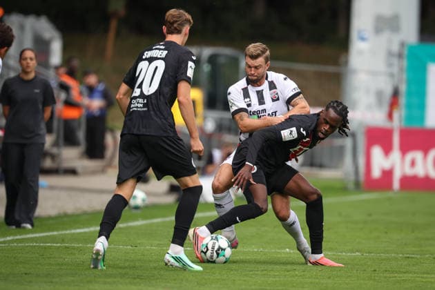 3rd Division, 2026–27 Season: Viktoria Köln vs. FC Ingolstadt 04; Yannick Deichmann (No. 20, FCI) and Tonyw Yannick Aime (No. 7, Viktoria Köln); Photo by Jürgen Meyer; 3rd Division, 2026–27 Season: Viktoria Köln vs. FC Ingolstadt 04
