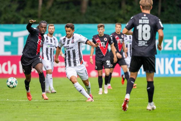 Yannick Tonye (Viktoria Köln, 07) in a tackle with Fredrik Carlsen (FC Ingolstadt 04, 08), Yannick Deichmann (FC Ingolstadt 04, 20), Keanan Bennetts, FC Ingolstadt 04, 18; FC Viktoria Köln vs. FC Ingolstadt 04, soccer, 3rd League, Matchday 7, 2026–27 season, September 19, 2026, DFL regulations prohibit any use of photographs as image sequences and or quasi-video; FC Viktoria Köln vs. FC Ingolstadt 04, soccer, 3. Liga, Matchday 7, 2026–27 season, September 19, 2026, Cologne Copyright: xEibner-Pressefoto LukasxBaldygax EP_LBA