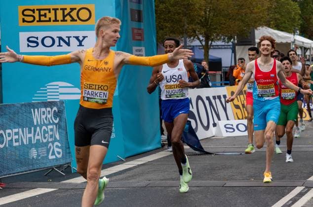 (260919) -- DENMARK, Sept. 19, 2026 -- Robert Farken of Germany (1st, L) celebrates after winning the men s road mile at the World Athletics Road Running Championships in Copenhagen, Denmark, Sept. 19, 2026. (Photo by Xinhua) (SP)DENMARK-COPENHAGEN-WORLD ATHLETICS ROAD RUNNING CHAMPIONSHIPS AndersxKongshaug 