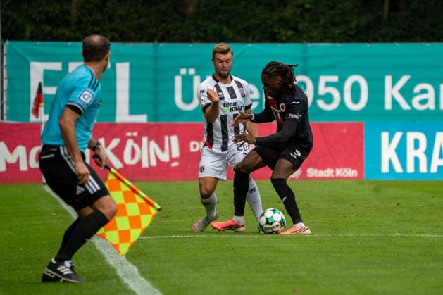 German Soccer, 3rd Division, 2026–27, Matchday 7, September 19, 2026 FC Viktoria Köln vs. FC Ingolstadt 04 Sportpark Höhenberg, Cologne Yannick Deichmann (FC Ingolstadt 04) and Joel Agyekum (FC Viktoria Köln) battle for the ball in Cologne, Germany Copyright: xMijoxLubecx