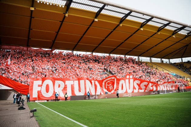 German Soccer 3rd Division 2026–2027, Matchday 7: Alemannia Aachen vs. Fortuna Düsseldorf at Tivoli Aachen; pre-game flag display, away section, Fortuna fans Copyright: xThiemoxRudolphx