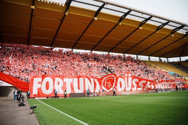 German Soccer 3rd Division 2026–2027, Matchday 7: Alemannia Aachen vs. Fortuna Düsseldorf at Tivoli Aachen; pre-game flag display, away section, Fortuna fans Copyright: xThiemoxRudolphx