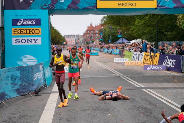 World Championship in the 5 km at the World Athletics Road Running Championships in Copenhagen: Jakob Ingebrigtsen of Norway, lying on the ground, after the 5-kilometer race during the World Athletics Road Running Championships in Copenhagen, Saturday, September 19, 2026. Photo by Emil Helms, Scanpix 2026, Copenhagen, Denmark  Copyright: EmilxHelmsx spdk20260919-150938-L