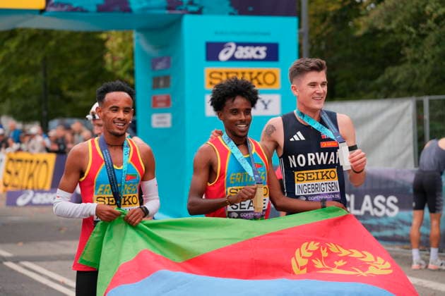 World Championship in the 5 km at the World Athletics Road Running Championships in Copenhagen: Dawit Seare of Eritrea (center) and Jakob Ingebrigtsen of Norway (right) after the 5-kilometer race during the World Athletics Road Running Championships in Copenhagen, Saturday, September 19, 2026. Photo by Emil Helms, Scanpix 2026, Copenhagen, Denmark  Copyright: EmilxHelmsx spdk20260919-151449-L
