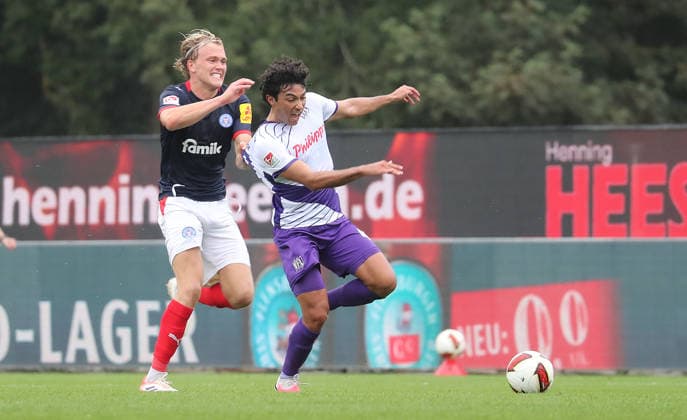 Noah Madsen, Holstein Kiel; Jonathan Gomez, VfL Osnabrück; Soccer, Men s, 2026–2027 Season, 2. Bundesliga, Holstein Stadium, Holstein Kiel vs. VfL Osnabrück, 1–1. DFL regulations prohibit any use of photographs as image sequences and or quasi-video.
