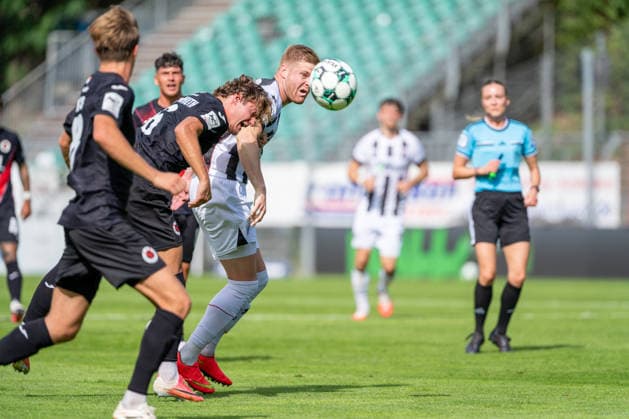 Tobias Eisenhuth (Viktoria Köln), 06, heading the ball past Lars Lokotsch (FC Ingolstadt 04), 13; tackle between FC Viktoria Köln and FC Ingolstadt 04; soccer; 3. Liga; Matchday 7; 2026–27 season, September 19, 2026, DFL regulations prohibit any use of photographs as image sequences and or quasi-video, FC Viktoria Köln vs. FC Ingolstadt 04, soccer, 3. Liga, Matchday 7, 2026–27 season, September 19, 2026, Cologne Copyright: xEibner-Pressefoto LukasxBaldygax EP_LBA