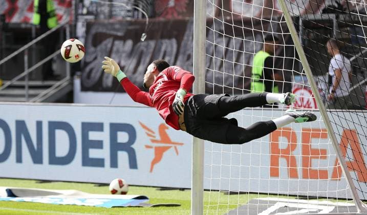 September 19, 2026 xmgoodx Frankfurt am Main, Deutsche Bank Park Bundesliga Season 2026–2027 Eintracht Frankfurt vs. SC Freiburg Cutout, Goalkeeper Noah Atubolu 1, Eintracht Frankfurt takes off during warm-ups DFL DFB REGULATIONS PROHIBIT ANY USE OF PHOTOGRAPHS AS IMAGE SEQUENCES AND OR QUASI-VIDEO