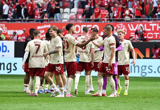Soccer, 2. Bundesliga, 2026–27 Season, September 19, 2026, Fritz Walter Stadium, 1. FC Kaiserslautern vs. Eintracht Braunschweig, 1–0. Jubilation among the Kaiserslautern fans after the home victory. From left: Marlon RITTER 1 FC Kaiserslautern, Paul JOLY 1 FC Kaiserslautern, Thierry TAZAMETA 1 FC Kaiserslautern, Jan ELVEDI 1 FC Kaiserslautern, Mika HAAS 1 FC Kaiserslautern 1 FC Kaiserslautern