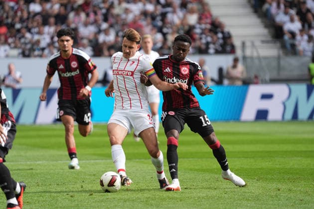Maximilian Eggestein (SC Freiburg) vs. Noel Aseko (Eintracht Frankfurt) in a tackle on September 19, 2026, Bundesliga, 2026–27 season, Eintracht Frankfurt vs. SC Freiburg, Deutsche Bank Park, Matchday 4
