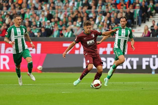 September 26, 2019, Germany, Soccer, 1st Bundesliga Men, Matchday 4, 2026–2027 Season, SV Werder Bremen vs. FC Augsburg Goal: 0–1 Scorer: Robin Fellhauer (FC Augsburg 19) scores the 0–1 goal past goalkeeper Karl Hein (SV Werder Bremen 01), no chance for Marco Friedl (SV Werder Bremen 32) and Olivier Deman (SV Werder Bremen 02), Weserstadion, Bremen, Germany Copyright: xnordphotoxGmbHx xTauchnitzx