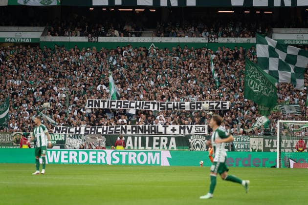 German Soccer 1st Bundesliga, Matchday 4, 2026–2027, Werder Bremen vs. FC Augsburg on September 19, 2026, at the Weserstadion in Bremen—fans, banners, flags, and signs sending anti-fascist greetings to Saxony-Anhalt and Mecklenburg-Western Pomerania Copyright: xSvenxHeidmannx