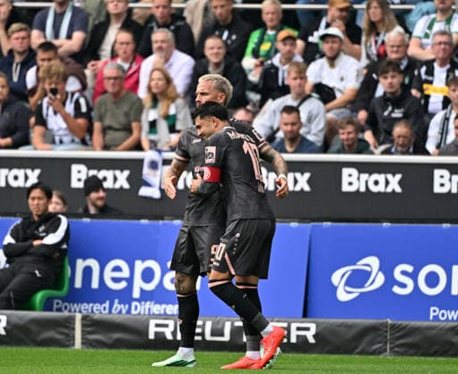 September 19, 2026, Mönchengladbach Soccer, Men s, 2026–2027 Season, Borussia Mönchengladbach vs. 1. FSV Mainz 05: Mainz celebrates after scoring the 1–1 goal; from left: goal scorer Phillip Tietz (Mainz), Nadiem Amiri (Mainz). DFL regulations prohibit any use of photographs as image sequences and or quasi-video content at Borussia Park, North Rhine-Westphalia, Germany