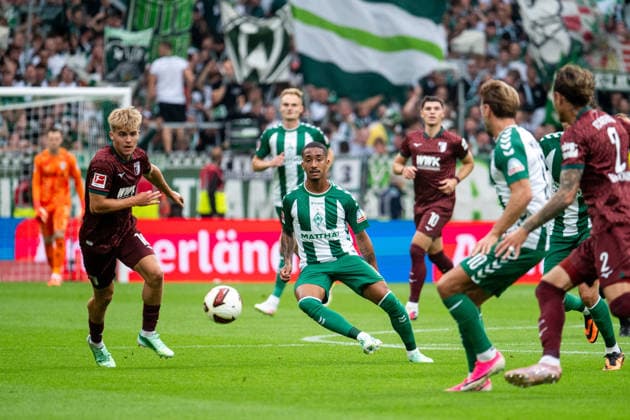 September 19, 2026, GER, Soccer, Men s, Bundesliga 1, 2026–2027 Season, Matchday 4, SV Werder Bremen vs. FC Augsburg: Arthur (Werder Bremen, No. 13) in a tackle with Hennes Behrens (FC Augsburg, No. 16). DFB and DFL regulations prohibit any use of photographs as image sequences and or quasi-video. Weserstadion, Bremen, Germany Copyright: xNordphoto Memmlerx