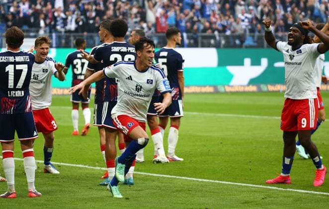 September 19, 2026, xcex, GER, Hamburg, Volksparkstadion, Bundesliga 1, 2026–2027 season, Matchday 4, HSV, FC, Hamburger SV vs. 1. FC Köln, goal celebration, Celebration, Goal celebration, Nicolas Capaldo (HSV) scores the goal with a header to make it 1–0 and celebrates with teammates Fabio Viera and Terem Moffi (HSV). DFL regulations prohibit any use of photographs as image sequences and or quasi-video.
