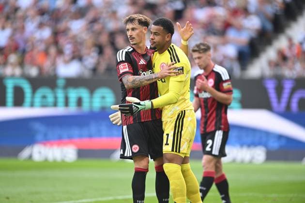 Soccer, Bundesliga 1, Matchday 4: Eintracht Frankfurt vs. SC Freiburg on September 19, 2026, at Deutsche Bank Park in Frankfurt. Robin Koch (Frankfurt, left) and Noah Atubolu (Frankfurt, right). DFL regulations prohibit any use of photographs as image sequences and or quasi-video. xJKx