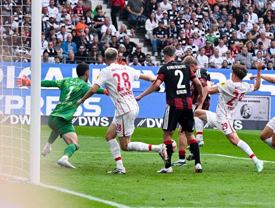 September 19, 2026, xpsx, Soccer, Bundesliga 1, Eintracht Frankfurt vs. SC Freiburg – Goal to make it 2–1 by Mio Backhaus (SC Freiburg), Matthias Ginter, SC Freiburg; Elias Baum, Eintracht Frankfurt; goal scorer Jonathan Jonny Burkardt, Eintracht Frankfurt; Philipp Treu, SC Freiburg. DFL and DFB regulations prohibit any use of photographs as image sequences and or quasi-video. Eintracht Frankfurt