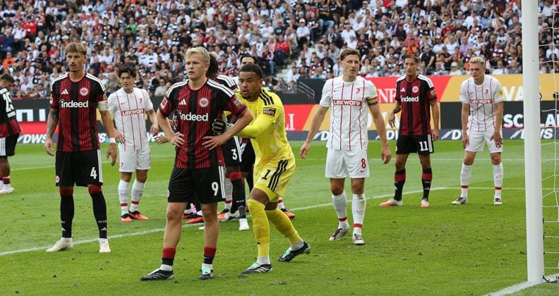 September 19, 2026 xmgoodx Frankfurt am Main, Deutsche Bank Park Bundesliga Season 2026–2027 Eintracht Frankfurt vs. SC Freiburg Goalkeeper Noah Atubolu 1, Eintracht Frankfurt s Jonathan Burkhardt 9, Eintracht Frankfurt takes the lead. DFL and DFB regulations prohibit any use of photographs as image sequences and or quasi-video.