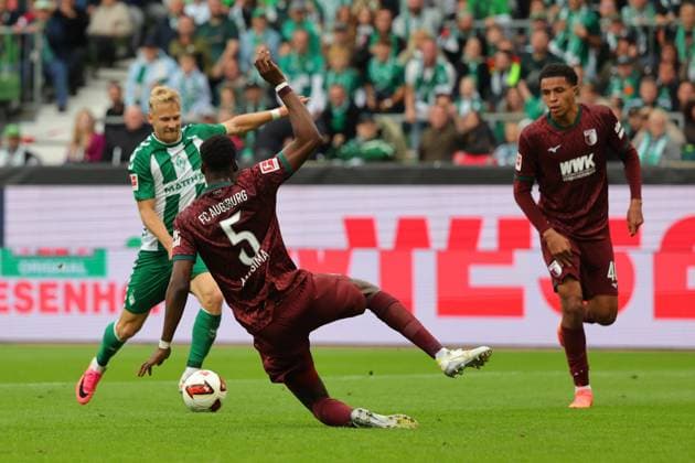September 26, 2019, GER, Soccer, 1st Bundesliga Men, Matchday 4, 2026–2027 Season, SV Werder Bremen vs. FC Augsburg Goal: 1–2 Scorer: Marco Grüll (SV Werder Bremen) scores the 1–2 goal after dribbling past Chrislain Matsima (FC Augsburg) at the Weserstadion in Bremen, Germany Copyright: xnordphotoxGmbHx xTauchnitzx