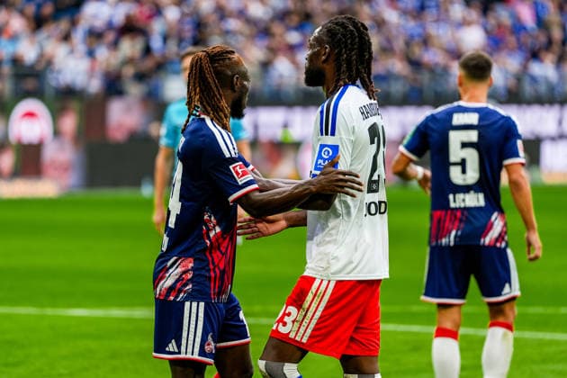 Germany Soccer Bundesliga 2026–27, Matchday 4: Hamburger SV (HSV) vs. 1. FC Köln, Volkspark Stadium, Hamburg: Gideon Mensah (1. FC Köln), 14; Jordan Torunarigha (Hamburger SV), 23 Copyright: xStefanxTrochax