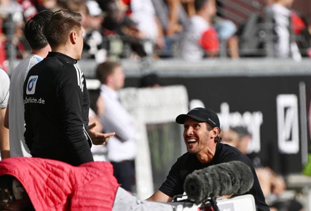 September 19, 2026, xjhx, Soccer, Bundesliga 1, Eintracht Frankfurt vs. SC Freiburg; Coach Julian Schuster of SC Freiburg gesticulates with his arms; DFL and DFB regulations prohibit any use of photographs as image sequences and or quasi-video; Frankfurt am Main