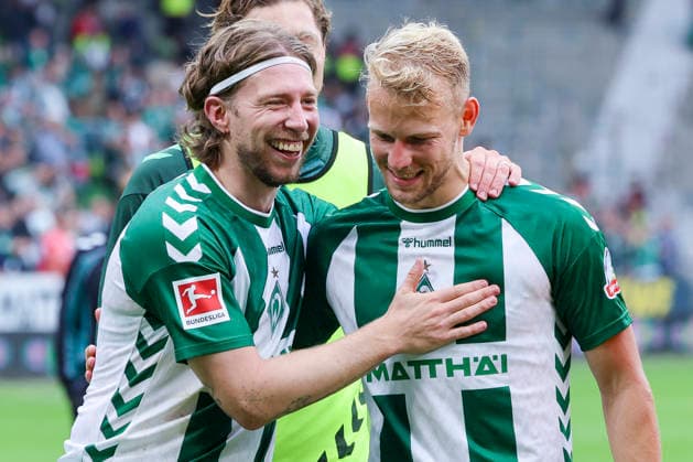 Mitchell Weiser of Werder Bremen and Marco Gruell of Werder Bremen celebrate during the Bundesliga 1 match between SV Werder Bremen and FC Augsburg at Weserstadion on September 19, 2026, in Bremen, Germany Photo by Marco Steinbrenner, DeFodi Images Mitchell Weiser of Werder Bremen and Marco Gruell of Werder Bremen cheer during the Bundesliga match between SV Werder Bremen and FC Augsburg at Weserstadion on September 19, 2026 in Bremen, Germany. Photo by Marco Steinbrenner, DeFodi Images. DFB and DFL regulations prohibit any use of photographs as image sequences and or quasi-video. Photo by Marco Steinbrenner, DeFodi Images.