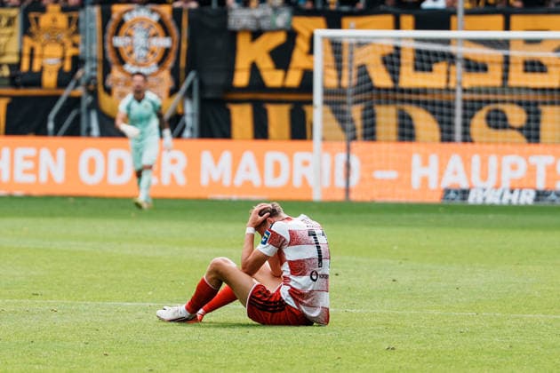 German Soccer 3rd Division 2026–2027, Matchday 7: Alemannia Aachen vs. Fortuna Düsseldorf at Tivoli Aachen; Lukas Eixler of Fortuna Düsseldorf, 11, on the ground after a tackle, head down, frustrated Copyright: xThiemoxRudolphx