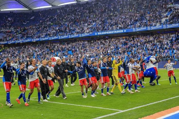 HSV players celebrate at the end of the game in front of the North Stand, Germany, Hamburg, Volksparkstadion, soccer, Bundesliga 1, Hamburger SV vs. 1. FC Köln