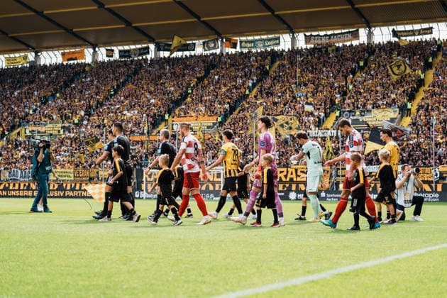 German Soccer 3rd Division 2026–2027, Matchday 7: Alemannia Aachen vs. Fortuna Düsseldorf at Tivoli Aachen; Teams enter the field in front of the Werner Fuchs Stand; sold out Copyright: xThiemoxRudolphx