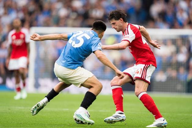 Declan Rice of Arsenal takes on Diego Gomez of Brighton and Hove Albion Brighton and Hove Albion v Arsenal, Premier League, Football, American Express Stadium, Brighton, UK - 19 Sep 2026Brighton American Express Stadium United Kingdom EDITORIAL USE ONLY No use with unauthorised audio, video, data, fixture lists, club league logos or live services. Online in-match use limited to 120 images, no video emulation. No use in betting, games or single club league player publications. Copyright: xWiredxPhotos Shutterstockx 17158693ee