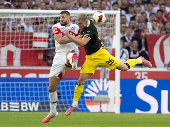 September 19, 2026, GER, Soccer, Men s, Bundesliga 1, 2026–2027 Season, Matchday 4, VfB Stuttgart vs. Borussia Dortmund: Jeff Chabot (VfB Stuttgart, 24) and Julian Ryerson (Borussia Dortmund, 26) in a tackle. DFB and DFL regulations prohibit any use of photographs as image sequences and or quasi-video. Stuttgart MHP Arena, Baden-Württemberg, Germany Copyright: xNordphoto WolfgangxFrankx