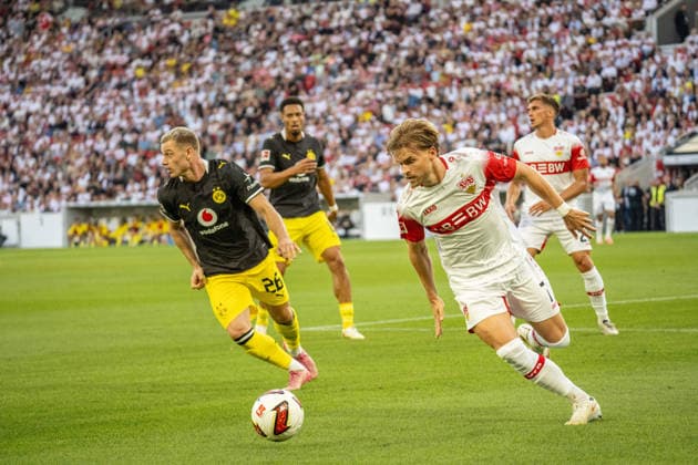 September 19, 2026, xdaymx, Soccer, Bundesliga 1, VfB Stuttgart vs. Borussia Dortmund; Julian Ryerson of Borussia Dortmund in a tackle with Maximilian Mittelstädt of VfB Stuttgart; DFL; DFB; REGULATIONS PROHIBIT ANY USE OF PHOTOGRAPHS AS IMAGE SEQUENCES AND OR QUASI-VIDEO; Stuttgart
