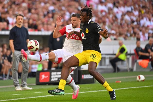 Joane GADOU (Borussia Dortmund), Action, Tackle against Ermedin DEMIROVIC (VFB Stuttgart), Soccer, Bundesliga Season 2026–2027, Matchday 4, Matchday 04, VfB Stuttgart vs. Borussia Dortmund on September 19, 2026, MHP ARENA