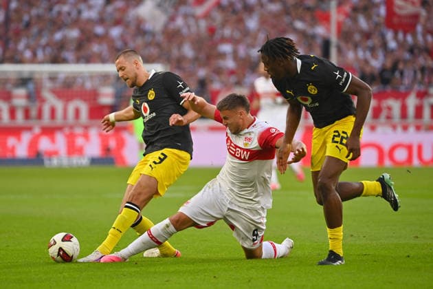 From left: Ramy BENSEBAINI, Borussia Dortmund; srg09; Joane GADOU, Borussia Dortmund; action, tackle; Soccer, Bundesliga, 2026–2027 season, Matchday 4, Matchday 04, VfB Stuttgart vs. Borussia Dortmund on September 19, 2026, MHP ARENA