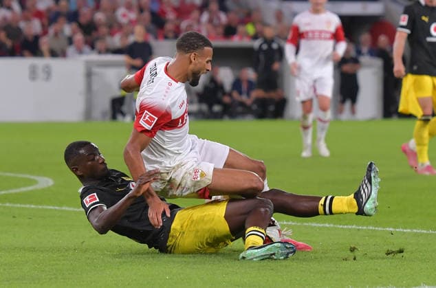 September 19, 2026, xblx, Soccer, Bundesliga 1, VfB Stuttgart vs. Borussia Dortmund, Serhou Guirassy (Borussia Dortmund), Josha Vagnoman (VfB Stuttgart). DFL and DFB regulations prohibit any use of photographs as image sequences and or quasi-video. Stuttgart