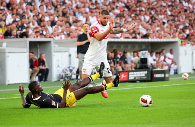 September 19, 2026, Germany, Stuttgart, Bundesliga, VfB Stuttgart vs. Borussia Dortmund, from left: Serhou Guirassy (BVB), Jeff Chabot (VfB)
