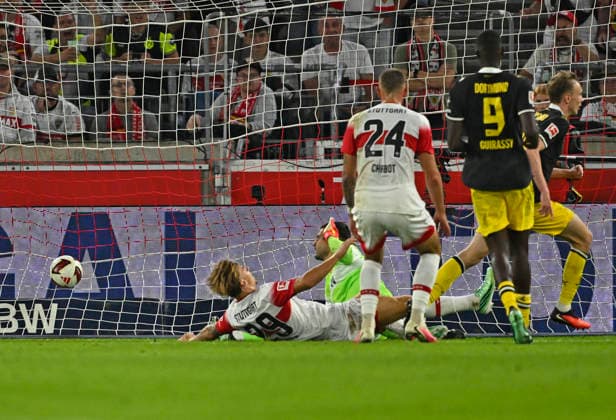 September 19, 2026, Soccer, 1. Bundesliga 2026–2027, Matchday 4, VfB Stuttgart vs. Borussia Dortmund, at the MHP Arena in Stuttgart, Goalkeeper Fabian Bredlow of Stuttgart concedes the 0–1 goal to Maximilian Beier of Borussia Dortmund