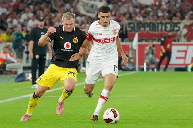 Pictured from left: Julian Ryerson of Borussia Dortmund, No. 26, in a tackle against Bilal El Khannouss of VfB Stuttgart, No. 11, September 19, 2026, VfB Stuttgart vs. Borussia Dortmund, Bundesliga 1, Matchday 4, Germany, Stuttgart, MHP Arena; DFL regulations prohibit any use of photographs as image sequences and or quasi-video Copyright: HMBxMedia xJulienxBecker