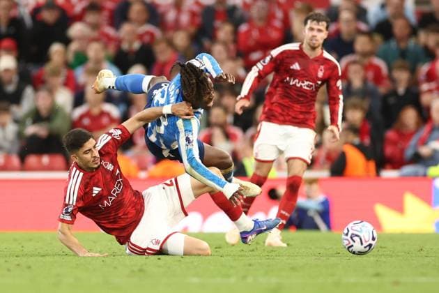 Brandon Thomas-Asante of Coventry City and Jair Cunha of Nottingham Forest in action. Nottingham Forest v Coventry City, Premier League, Football, The City Ground, Nottingham, UK - 19 Sep 2026Nottingham The City Ground United Kingdom EDITORIAL USE ONLY No use with unauthorised audio, video, data, fixture lists, club league logos or live services. Online in-match use limited to 120 images, no video emulation. No use in betting, games or single club league player publications.  Copyright: xRyanxBrowne Shutterstockx 17158587jk