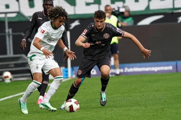 Mönchengladbach Soccer, 2026–2027 Bundesliga Season: Borussia Mönchengladbach vs. 1. FSV Mainz 05, September 19, 2026, Borussia Park, Mönchengladbach: Wael Mohya (Gladbach) and Eric Martel (1. FSV Mainz 05), Action, Single Frame