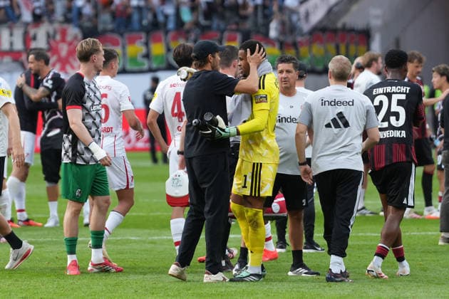 Julian Schuster, SC Freiburg, coach, and Noah Atubolu, Eintracht Frankfurt, 01, Germany, soccer, Bundesliga 1, Matchday 4, 2026–2027, Eintracht Frankfurt vs. SC Freiburg, September 19, 2026, Deutsche Bank Park, Frankfurt, Hesse, Germany Copyright: xArnexAmbergx