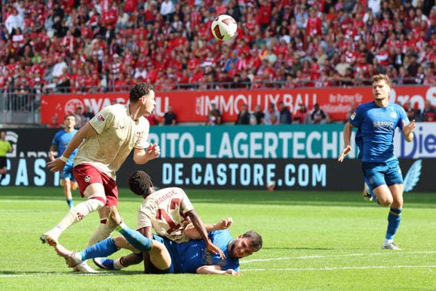 September 19, 2026, xrekx, Soccer, 2. Bundesliga, 1 FC Kaiserslautern vs. Eintracht Braunschweig: Goal to make it 1–0 by Erencan Yardimci; 1 FC Kaiserslautern: Mehmet Aydin; Eintracht Braunschweig: Ibrahim Kanate; 1 FC Kaiserslautern: Tackle, action, battle for the ball DFL DFB REGULATIONS PROHIBIT ANY USE OF PHOTOGRAPHS as IMAGE SEQUENCES and or QUASI-VIDEO Kaiserslautern