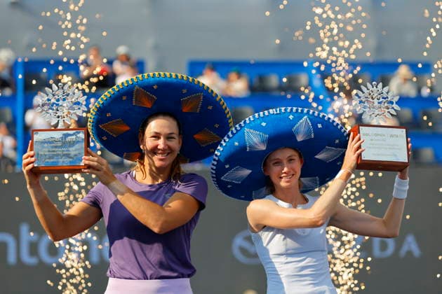 Guadalajara Open tennis tournament Cristina Bucsa (R) of Spain and Nicole Melichar-Martinez (L) of the USA celebrate pose with their trophies after defeating Momoko Kobori of Japan and Peangtarn Plipuech of Thailand during the doubles final of the Guadalajara Open tennis tournament in Guadalajara, Mexico, 19 September 2026. Guadalajara Mexico  Copyright: xFranciscoxGuascox