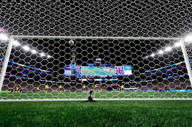 September 19, 2026; Foxborough, Massachusetts, USA; New England Revolution midfielder Carles Gil (10) scores a goal past the outstretched arm of Orlando City SC Goalkeeper Maxime Crepeau (71) in a Major League Soccer game at Gillette Stadium. (c) CSM - ZUMAc04_ 20260919_zma_c04_309 Copyright: xBurtxGranofskyx
