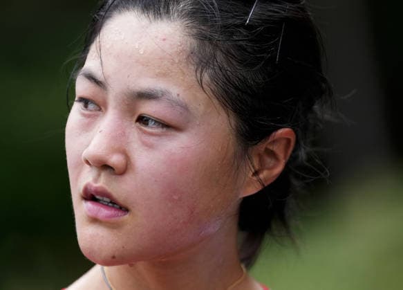 (260920) -- NAGOYA, Sept. 20, 2026 -- Zhang Hao of China reacts after the women s individual time trial of cycling road at the 20th Asian Games Aichi-Nagoya 2026 in Shinshiro of Aichi Prefecture, Japan, Sept. 20, 2026. ) (SP)JAPAN-NAGOYA-ASIAN GAMES-CYCLING ROAD-WOMEN S INDIVIDUAL TIME TRIAL LuixSiuxWai 