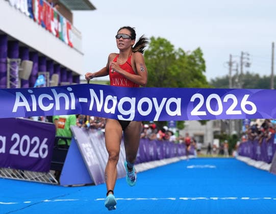 (260920) -- NAGOYA, Sept. 20, 2026 -- Lin Xinyu of China crosses the finish line during the women s individual triathlon final at the 20th Asian Games Aichi-Nagoya 2026 in Gamagori City of Aichi Prefecture, Japan, Sept. 20, 2026. ) (SP)JAPAN-NAGOYA-ASIAN GAMES-TRIATHLON-WOMEN S INDIVIDUAL FINAL CenxYunpeng 