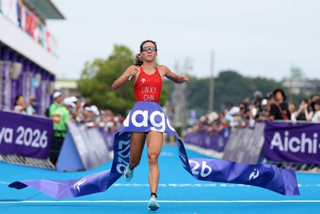 (260920) -- NAGOYA, Sept. 20, 2026 -- Lin Xinyu of China crosses the finish line during the women s individual triathlon final at the 20th Asian Games Aichi-Nagoya 2026 in Gamagori City of Aichi Prefecture, Japan, Sept. 20, 2026. ) (SP)JAPAN-NAGOYA-ASIAN GAMES-TRIATHLON-WOMEN S INDIVIDUAL FINAL DengxHua 